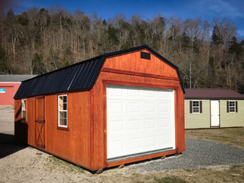 prebuilt garages in tennessee 2 - Esh's Utility Buildings A prebuilt garage in Tennessee with wooden siding and a loft